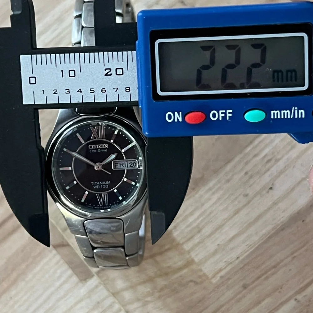 Citizen Eco-Drive Titanium Solar Black Dial Day Date Window Titanium Bracelet